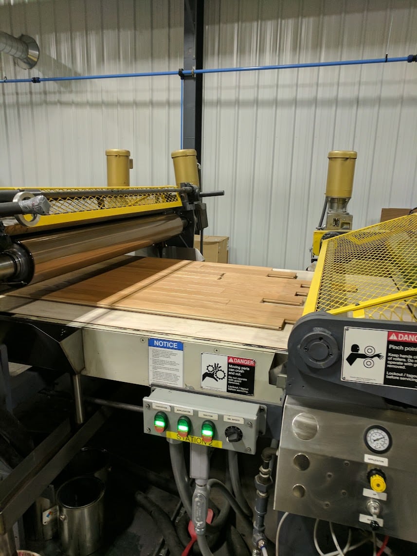 prefinished wood flooring going through drier