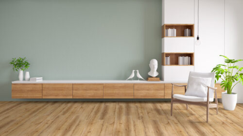 Minimalist living space with natural hardwood flooring, modern wood cabinetry, and Scandinavian-style decor – premium wood floors by Rustic Wood Floor Supply.